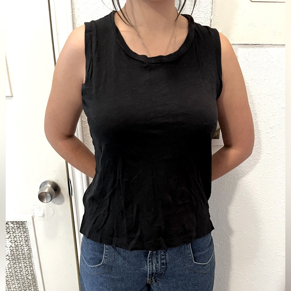 Madewell Black Muscle T Shirt , Tank Top
Size extra small but fits a small